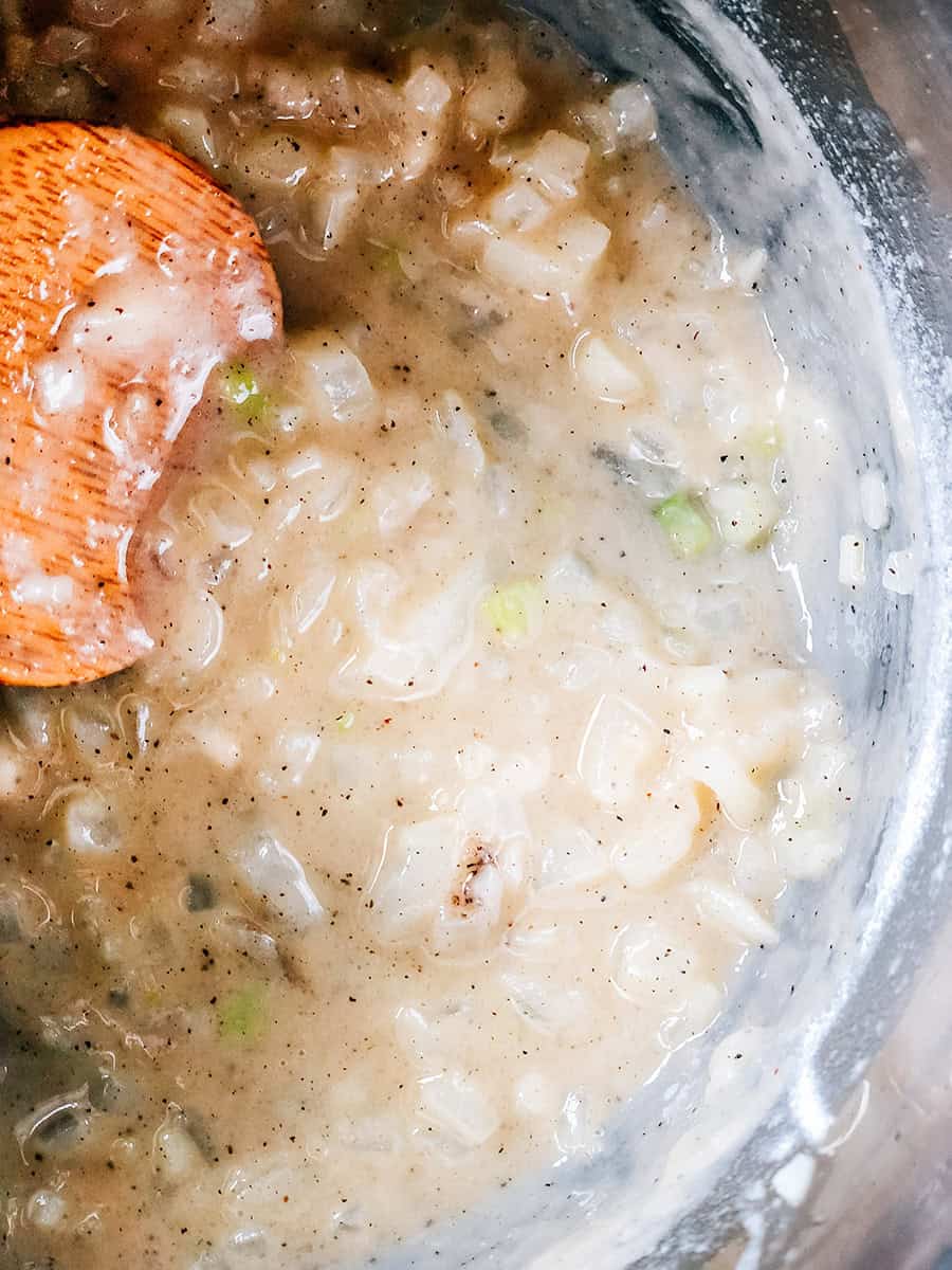 Flour, salt, and pepper mixed into the wilted onions and butter.