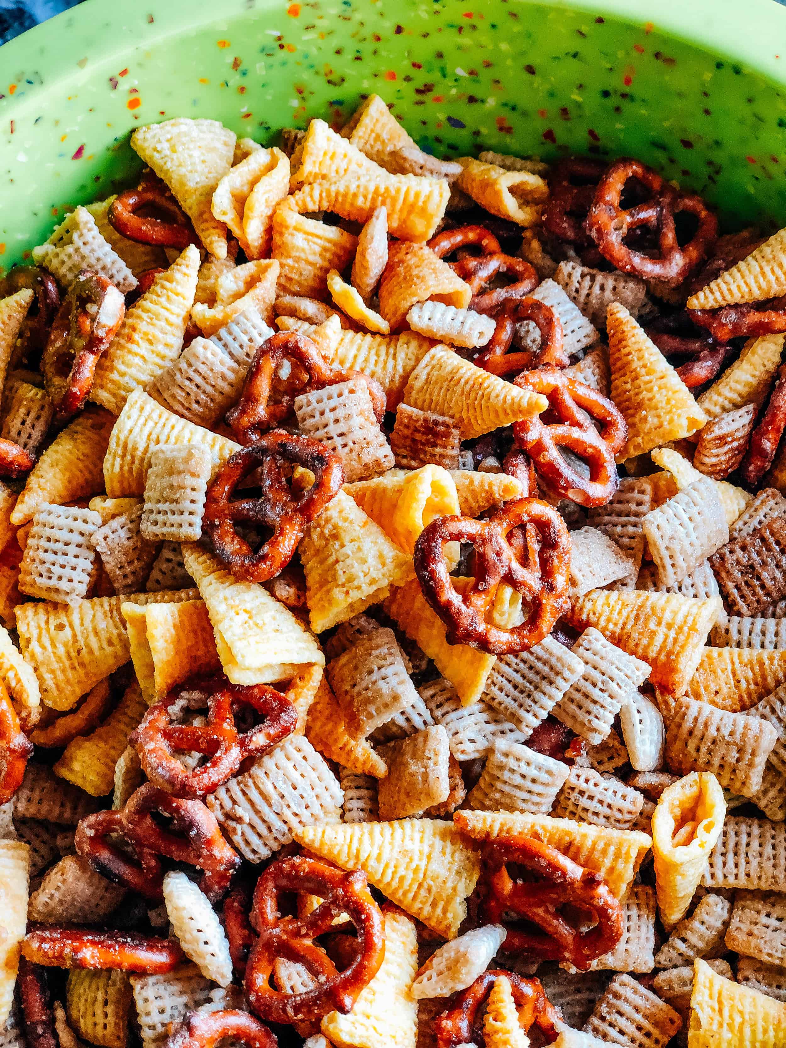 The completely baked and cooled snack mix in a large bowl.